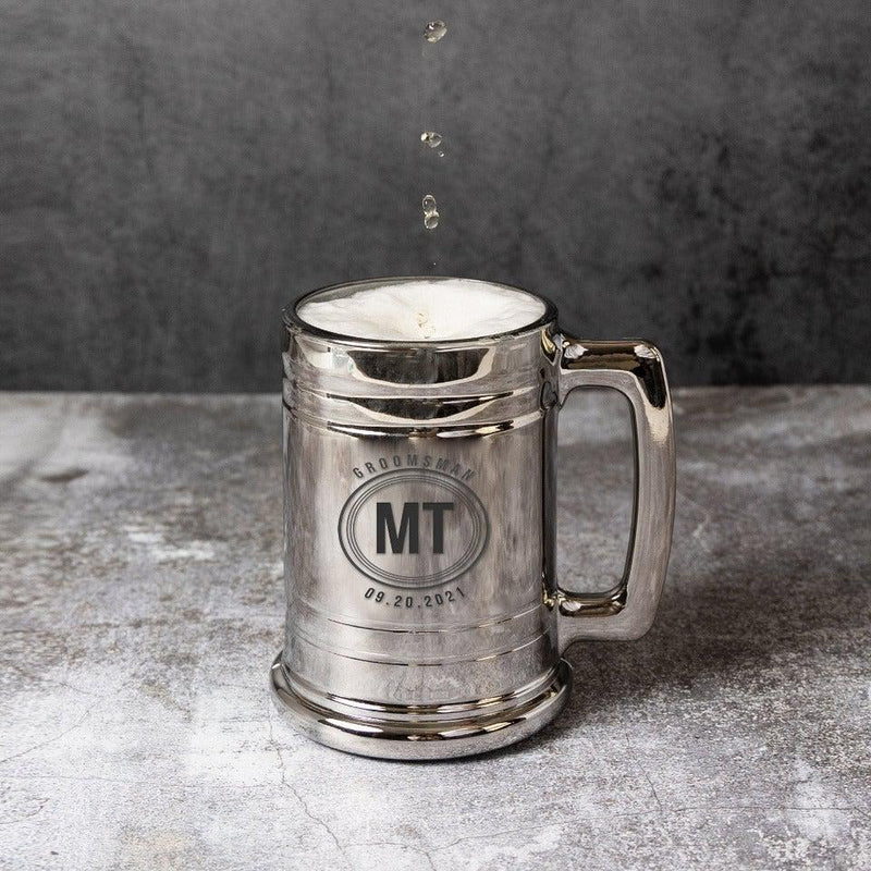 https://www.groomsshop.com/cdn/shop/products/staged_PersonalizedGroomsmenMetallicBeerMug_GC1427_OnGreywithBeerPouring__MTGroomsman_Square_32bedc8e-2a1d-45a8-9ba9-4312343f706f_800x.jpg?v=1640790332